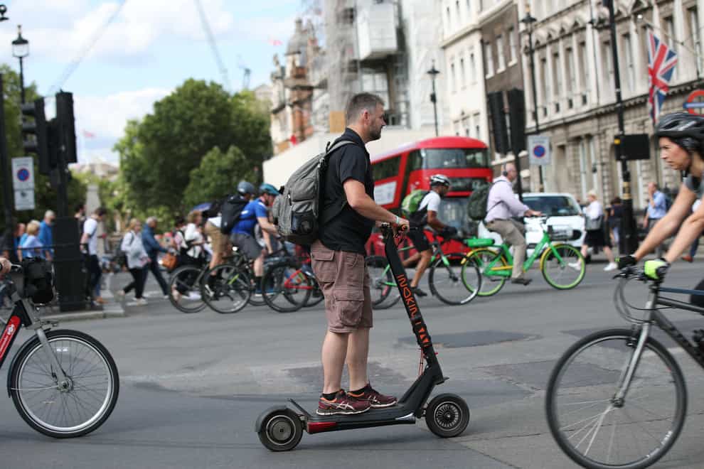 Rental e-scooter trials will not require riders to be trained or wear a helmet under Government plans (Yui Mok/PA)