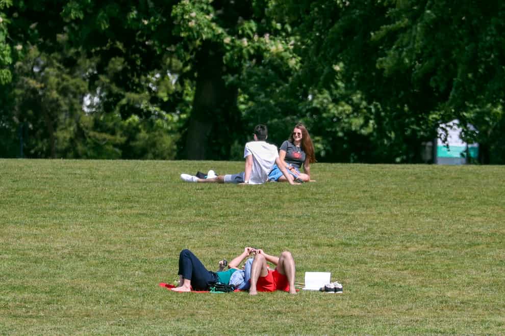 People enjoy the warm weather in Guildford