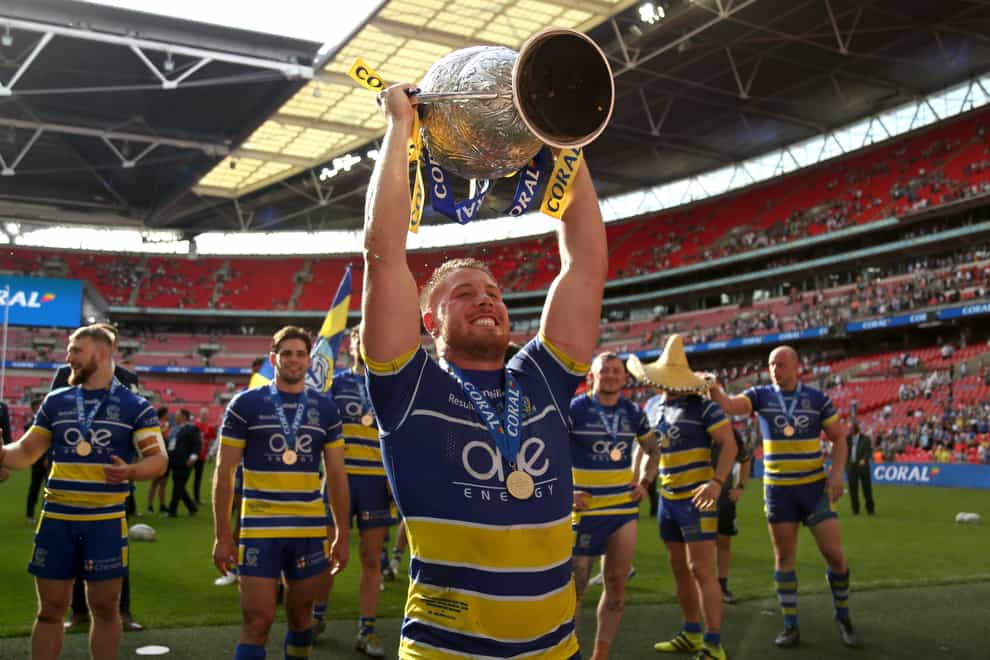Warrington Wolves celebrate their win last year (PA Images)