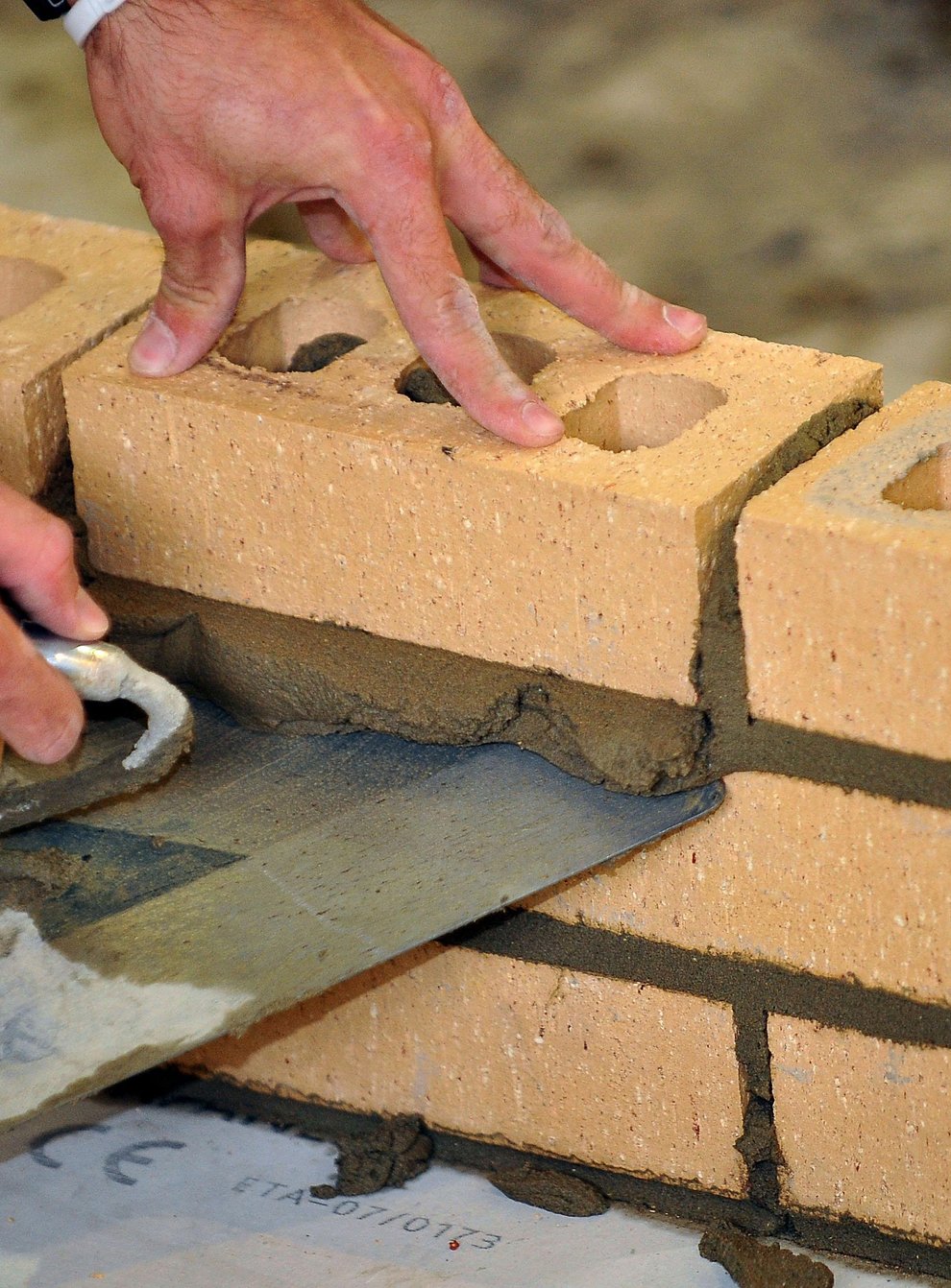 Bricks being laid