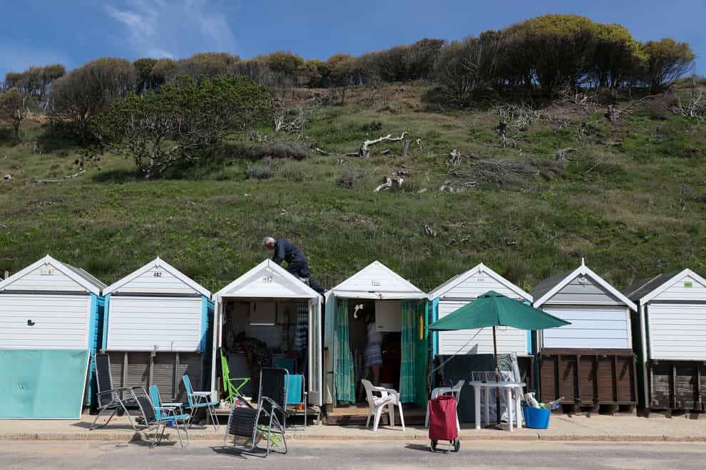 Beach huts on Boscombe beach in Dorset (Andrew Matthews/PA Wire)
