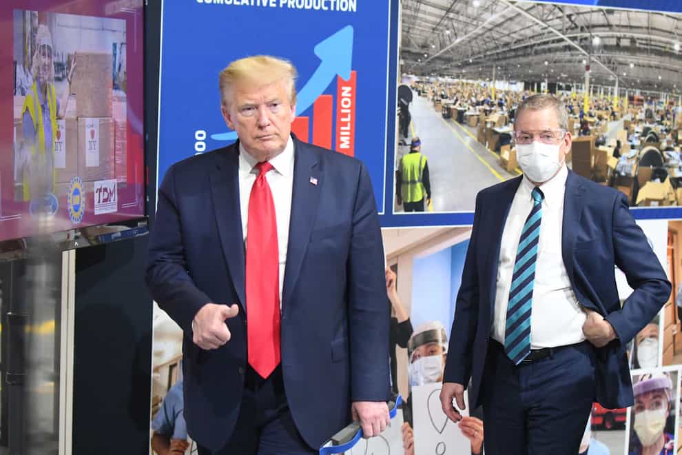 Donald Trump ignored guidance to wear a facemask at Michigan factory 