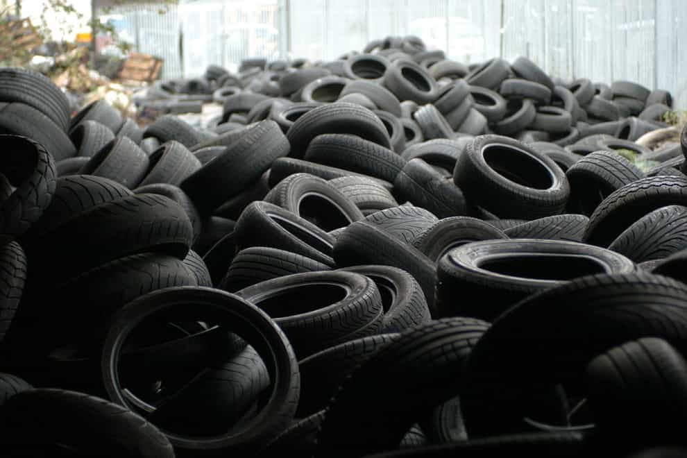 A pile of discarded car tyres