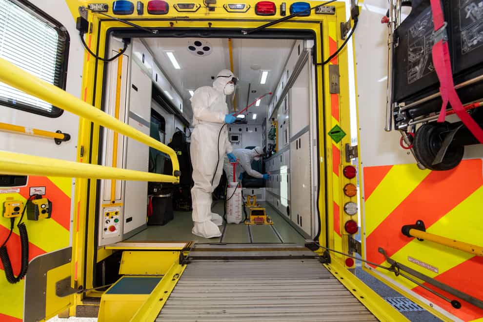 An ambulance worker wearing PPE