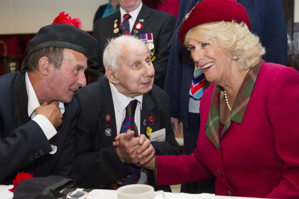 Jimmy Sinclair with carer Archie Howie and the Duchess of Cornwall, known as the Duchess of Rothesay when in Scotland
