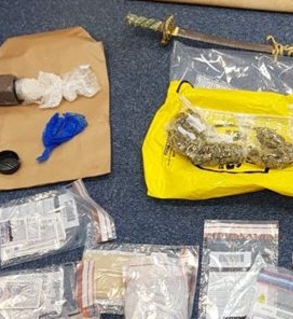 Illegal items seized during a crackdown on county lines gangs