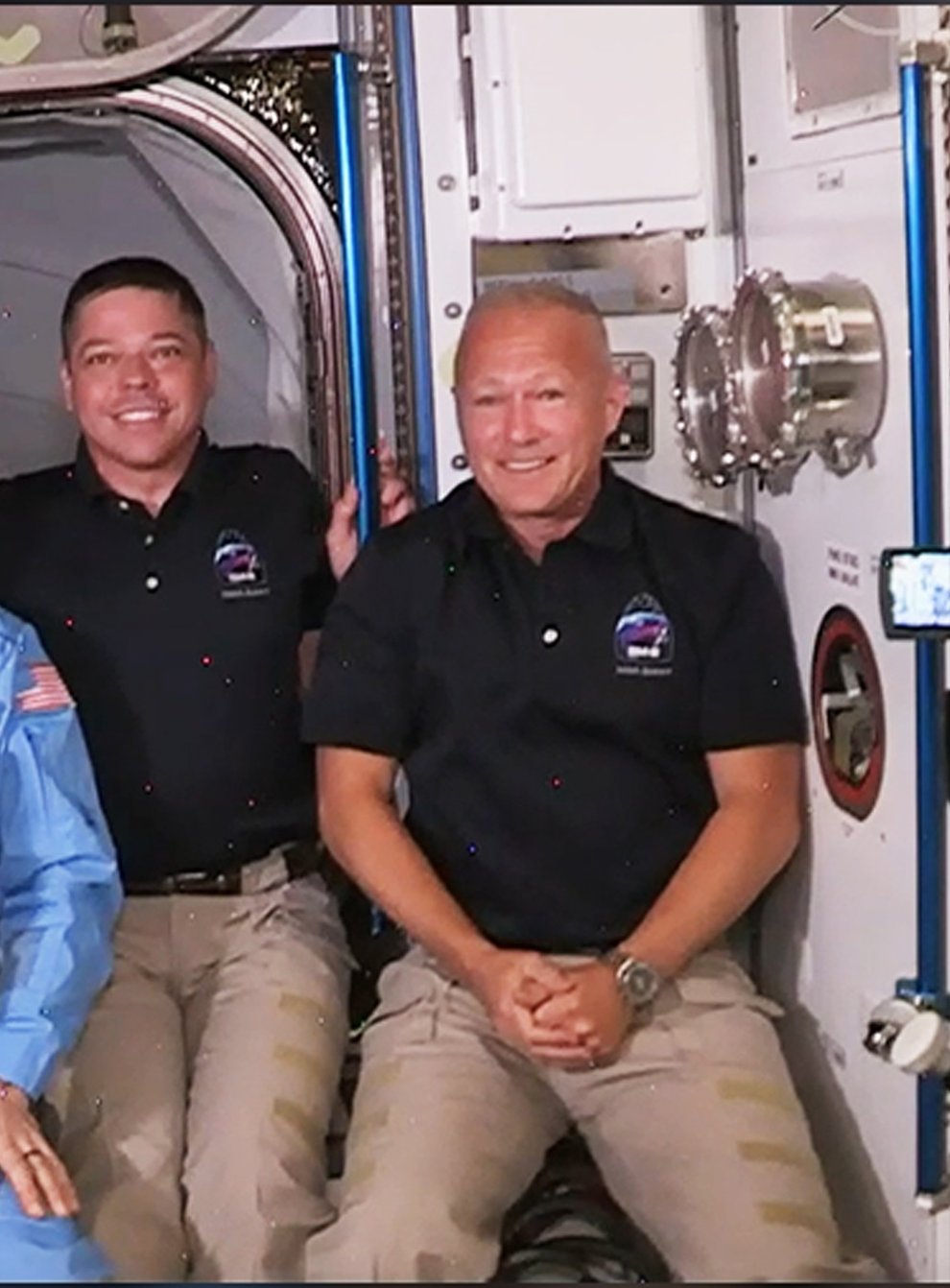 Behnken and Hurley, far right, join the ISS's existing crew