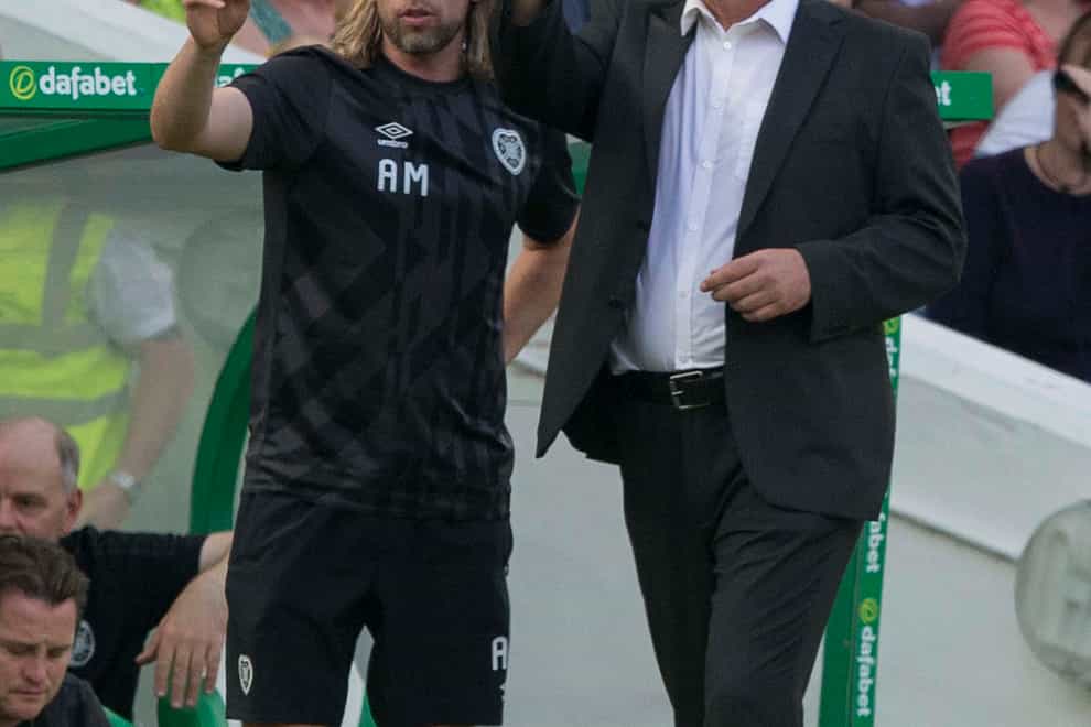 Craig Levein (right) and assistant Austin Macphee (left) have left Hearts