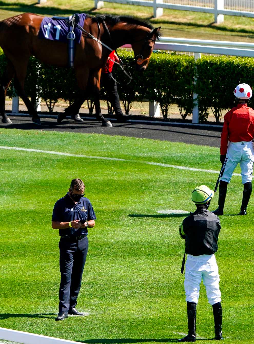 Jockeys observe social distancing at Newcastle Racecourse