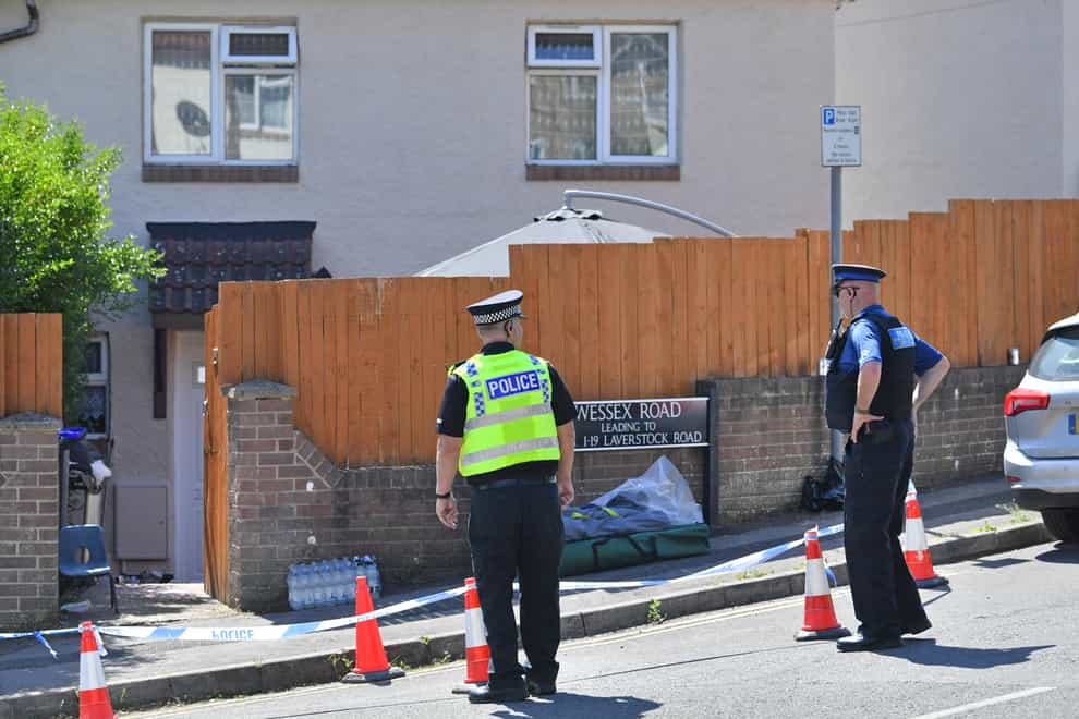 Police outside the property on Wessex Road (Ben Birchall/PA)