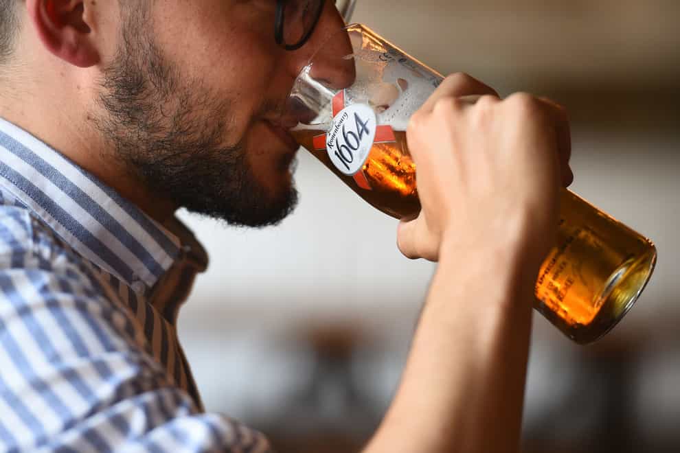A man drinking beer