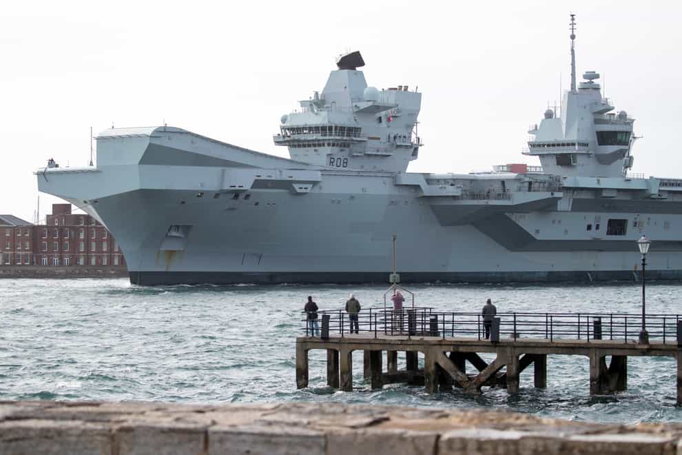 The Royal Navy aircraft carrier HMS Queen Elizabeth (Andrew Matthews/PA)
