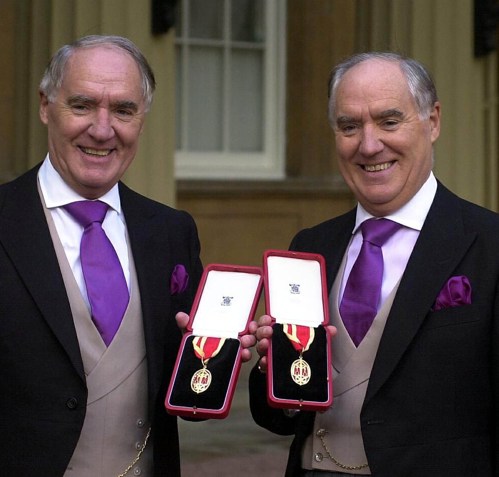 Sir David Barclay and his twin brother Sir Frederick Barclay after receiving their knighthoods at Buckingham Palace