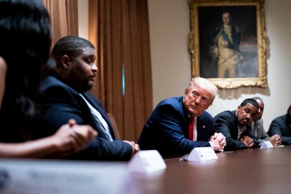 President Donald Trump meets African-American supporters in the Cabinet Room of the White House this week