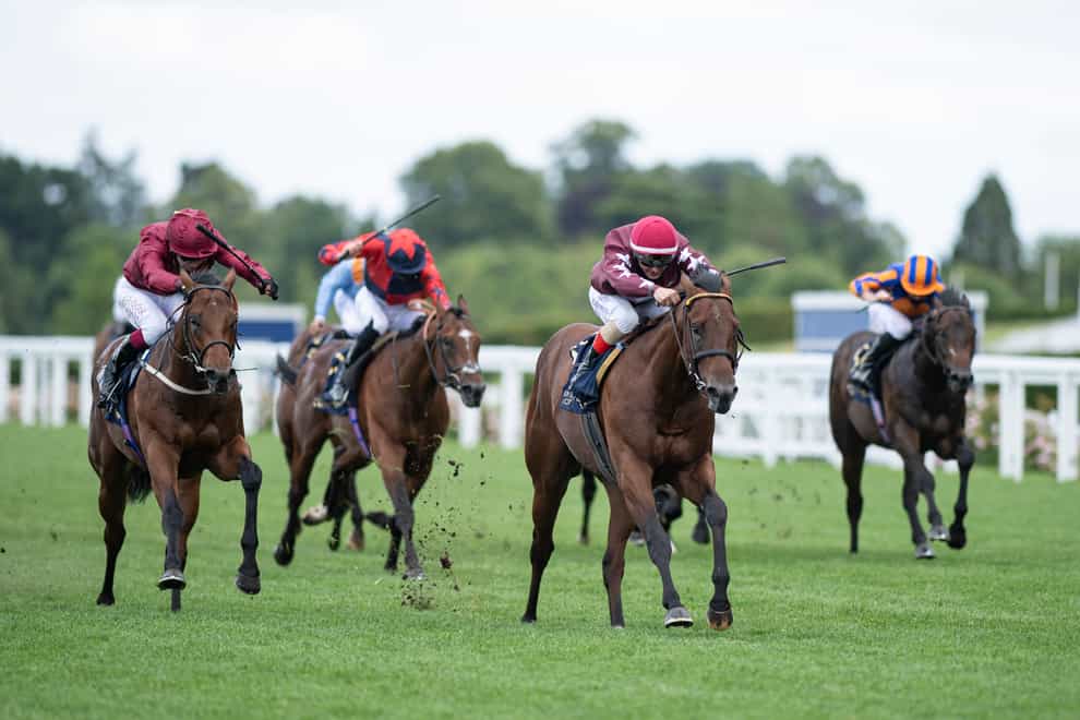 The Lir Jet (left) on the way to victory in the Norfolk Stakes