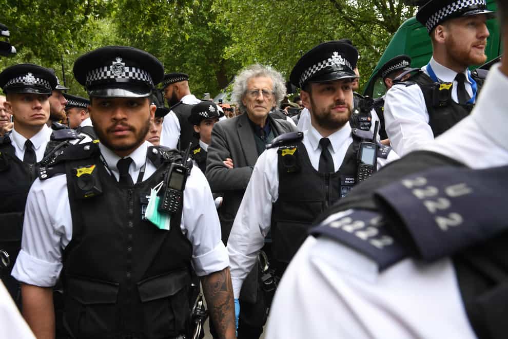 Police lead away Piers Corbyn from anti-lockdown protests in Hyde Park 