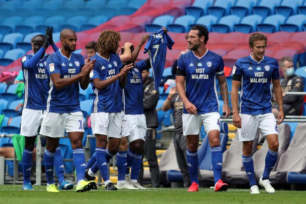 Junior Hoilett toasted the memory of Peter Whittingham having opened the scoring as Cardiff beat Leeds in south Wales.