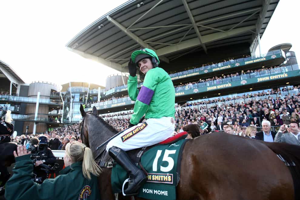 Liam Treadwell after winning the Grand National aboard Mon Mome