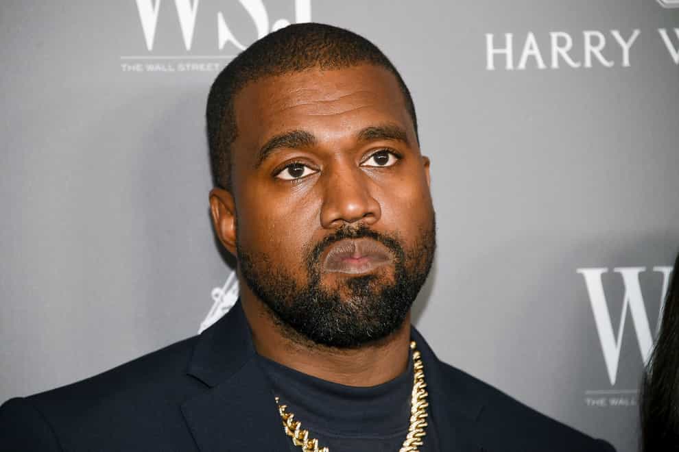 Kanye West will design adult and kids' clothing that will be sold at Gap's stores next year