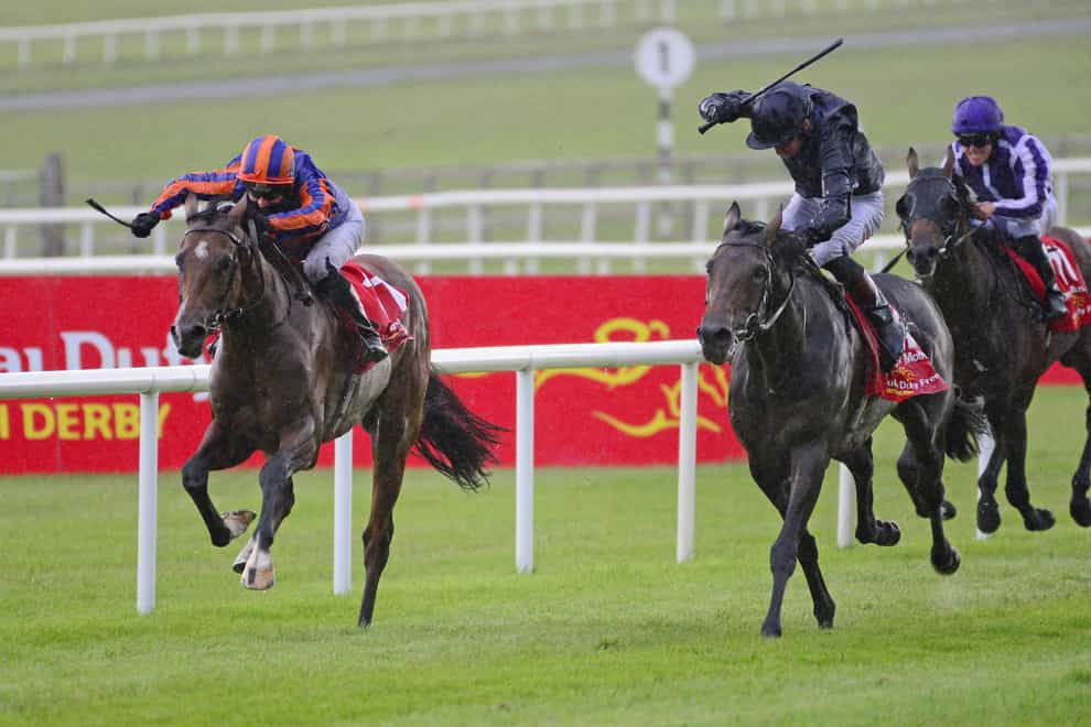 Santiago (left) held off stablemate Tiger Moth to land the Irish Derby