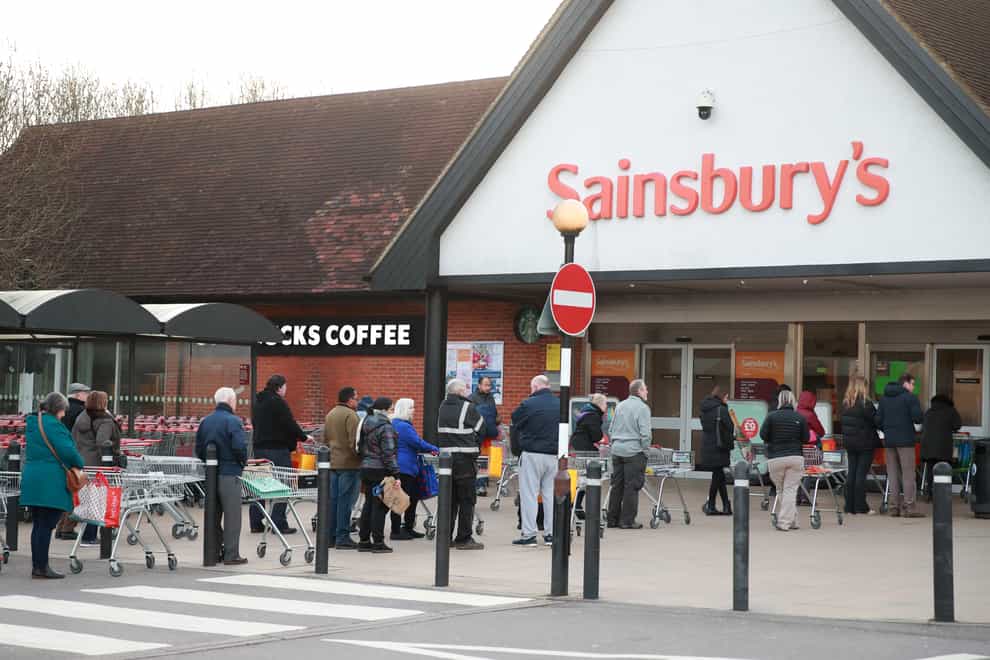 People queuing up outside Sainsburys