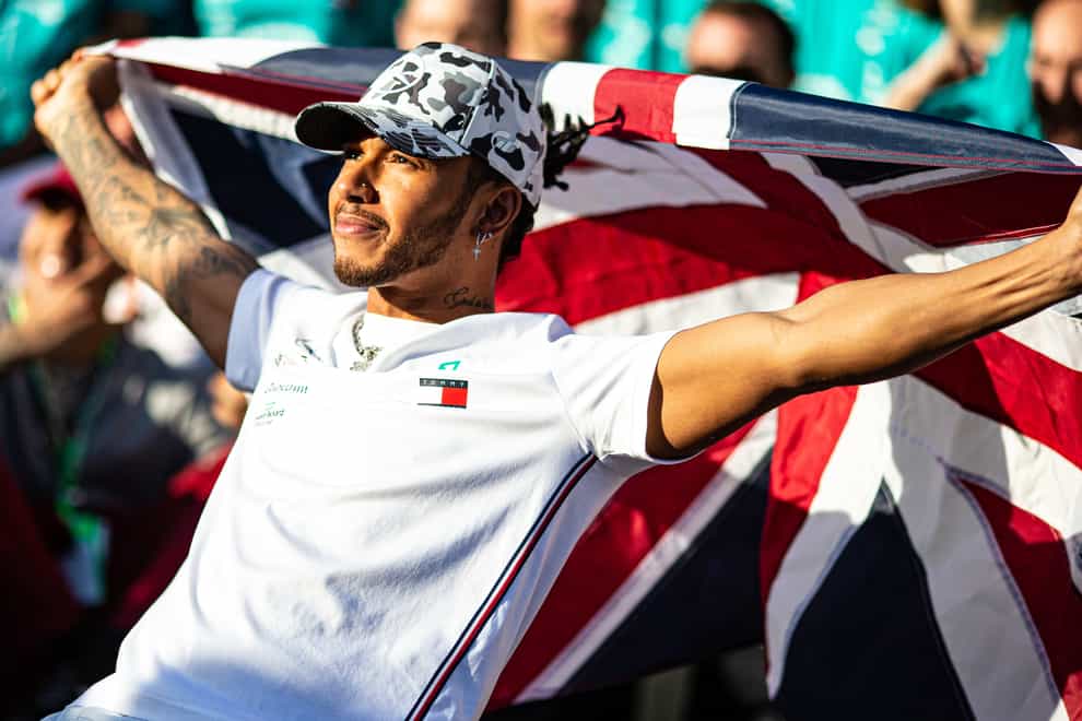 Lewis Hamilton celebrates winning his sixth world championship