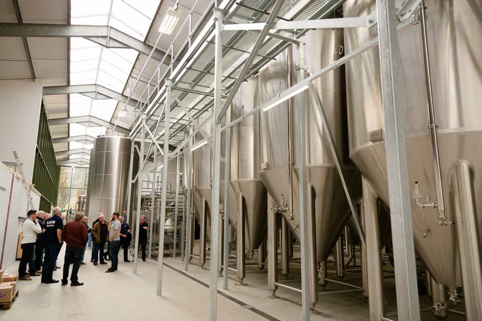 West Berkshire Brewery head brewer leads brewery tour