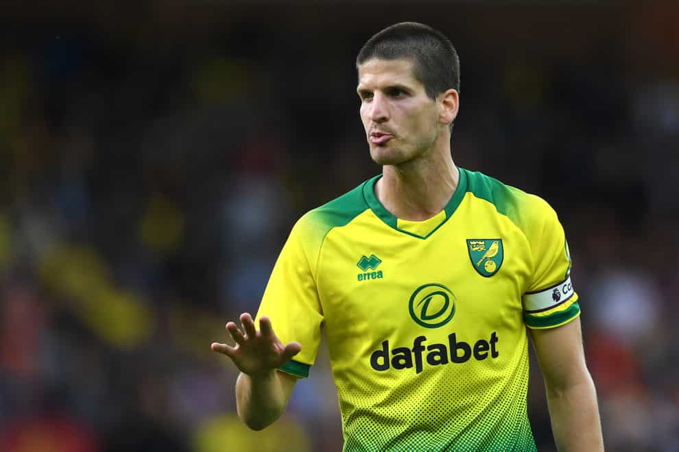 Norwich defender Timm Klose is available again following suspension