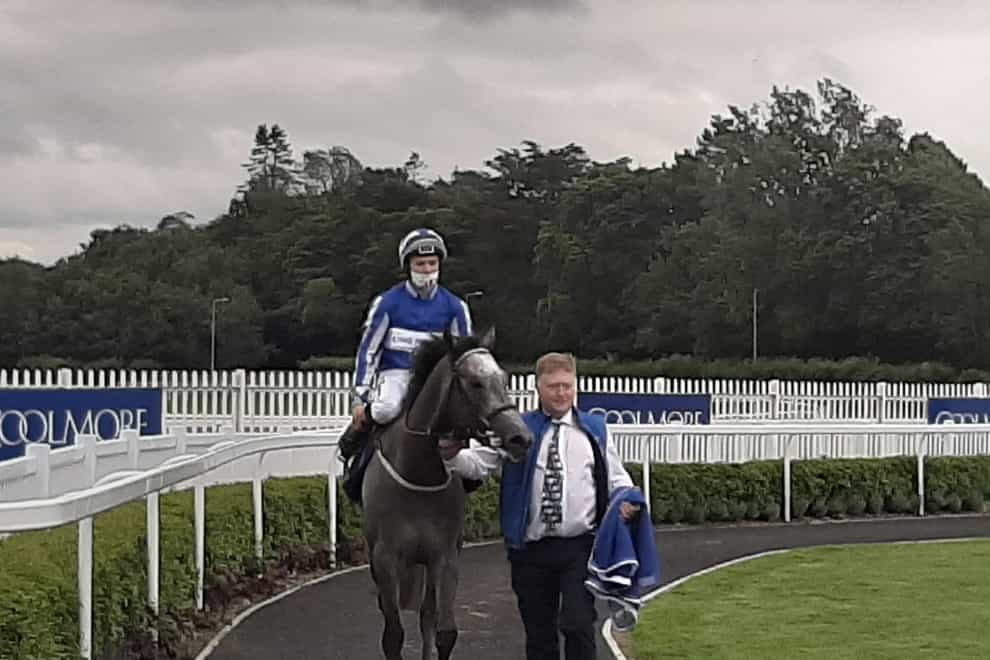 Art Power returns to the winner's enclosure at Naas