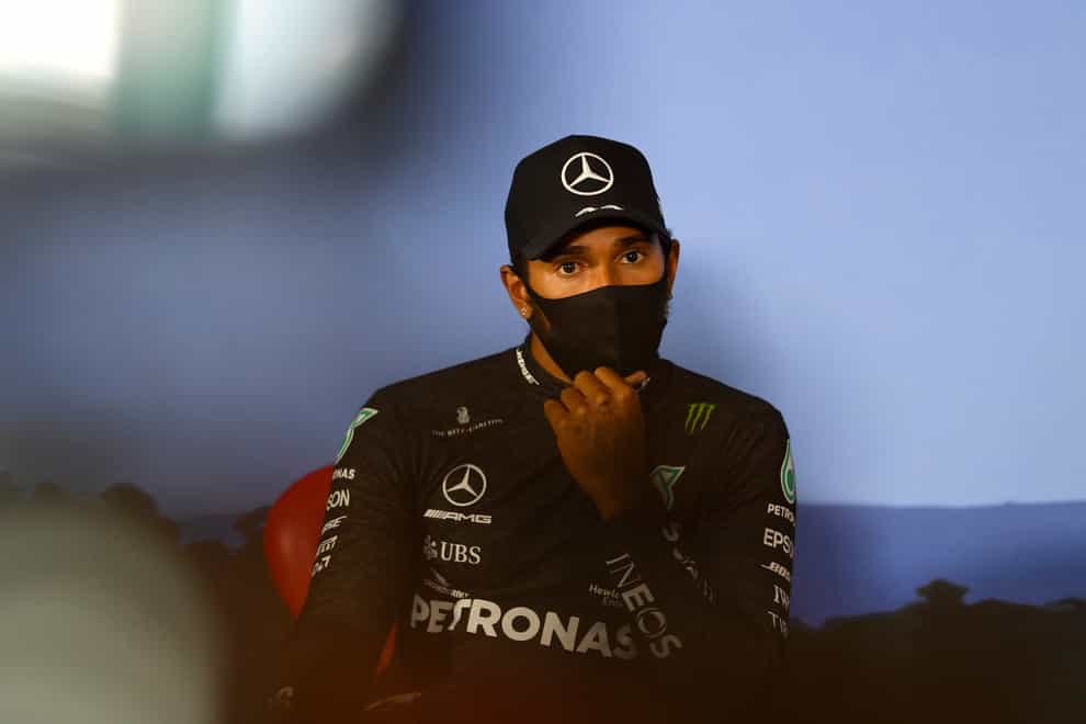 Lewis Hamilton has hinted at racism in Formula One