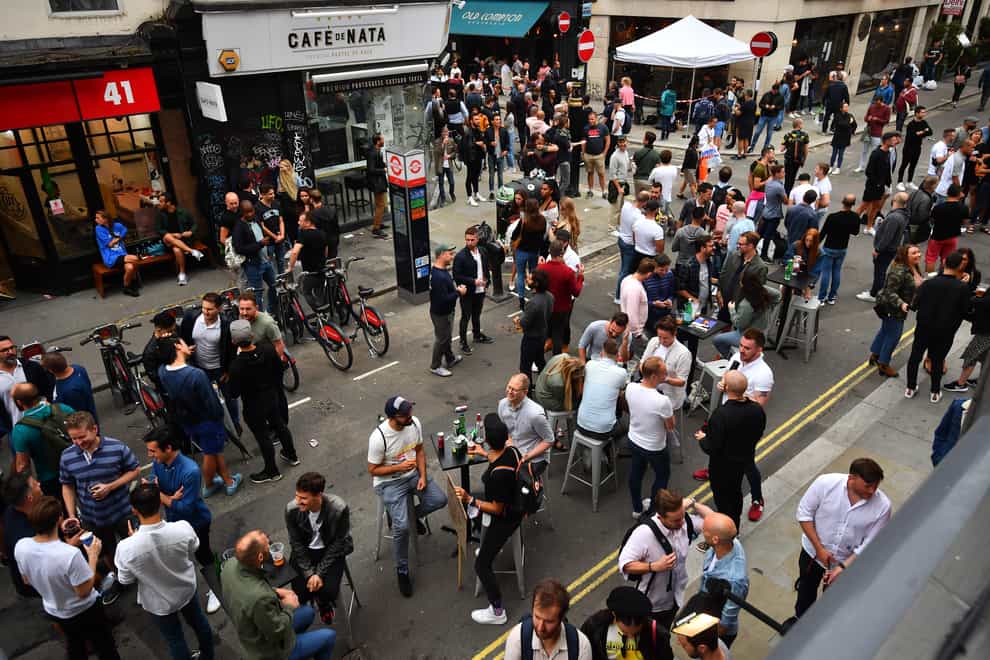 Drinkers in Soho, London, as coronavirus lockdown restrictions are eased across England