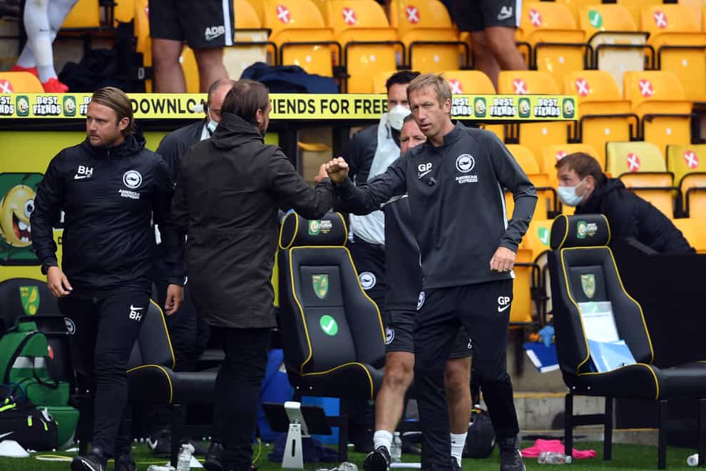 Graham Potter, right, has backed Norwich head coach Daniel Farke to bounce back from a difficult season in the Premier League