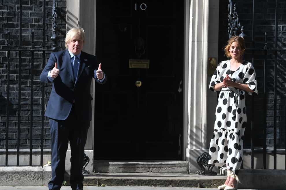 Prime Minister Boris Johnson and Annemarie Plas, founder of Clap For Our Carers, outside 10 Downing Street