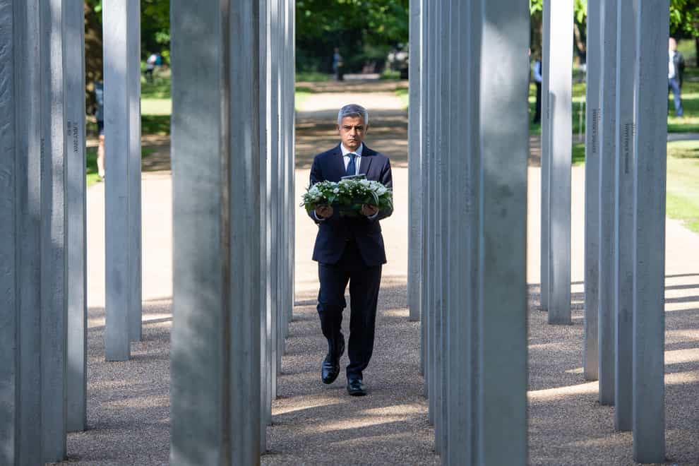 Mayor of London, Sadiq Khan approaches to lay a wreath