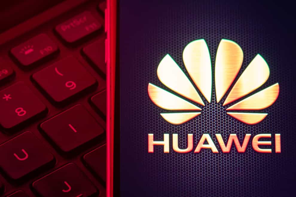 Huawei logo alongside close-up of computer keyboard
