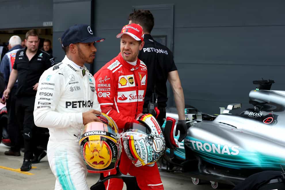 Lewis Hamilton, left, has won six world titles to Sebastian Vettel's four