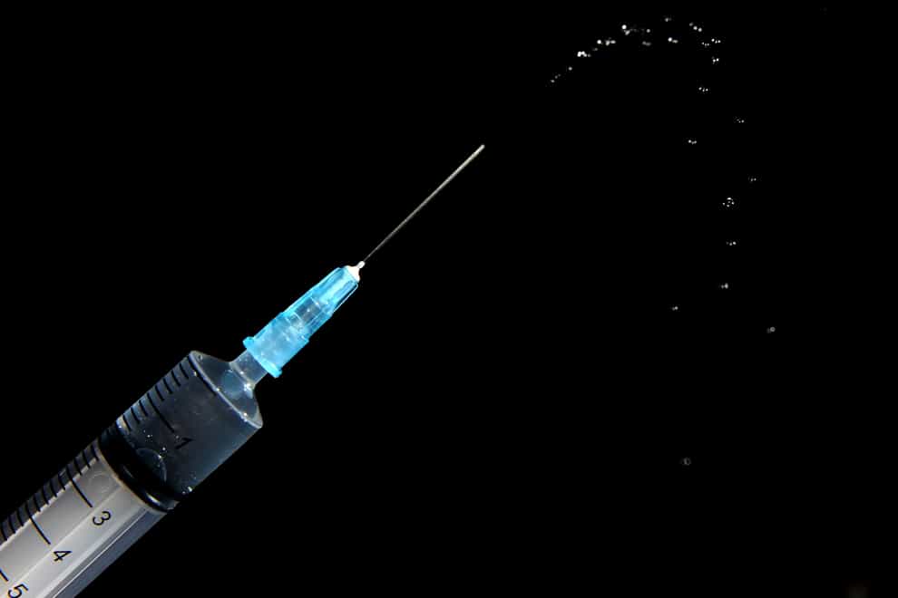 A syringe (Andrew Matthews/PA)