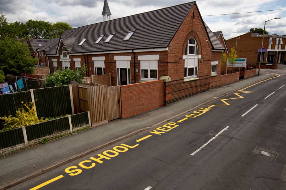 New school keep clear markings have been painted on a Wolverhampton road, more than 10 years after lessons stopped on the site (Jacob King/PA)