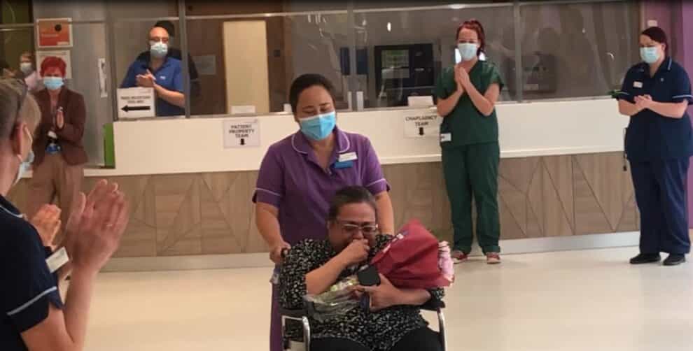 Ayesha Orlanda is clapped by hospital staff
