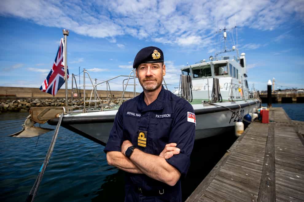 Royal Navy Senior Naval Officer Northern Ireland Commander John Patterson, pictured in front of HMS Biter