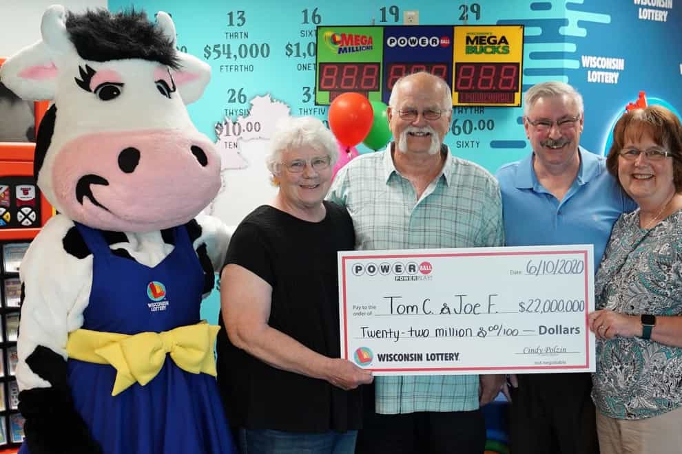 Lottery winners Tom Cook, Joe Feeney and their wives