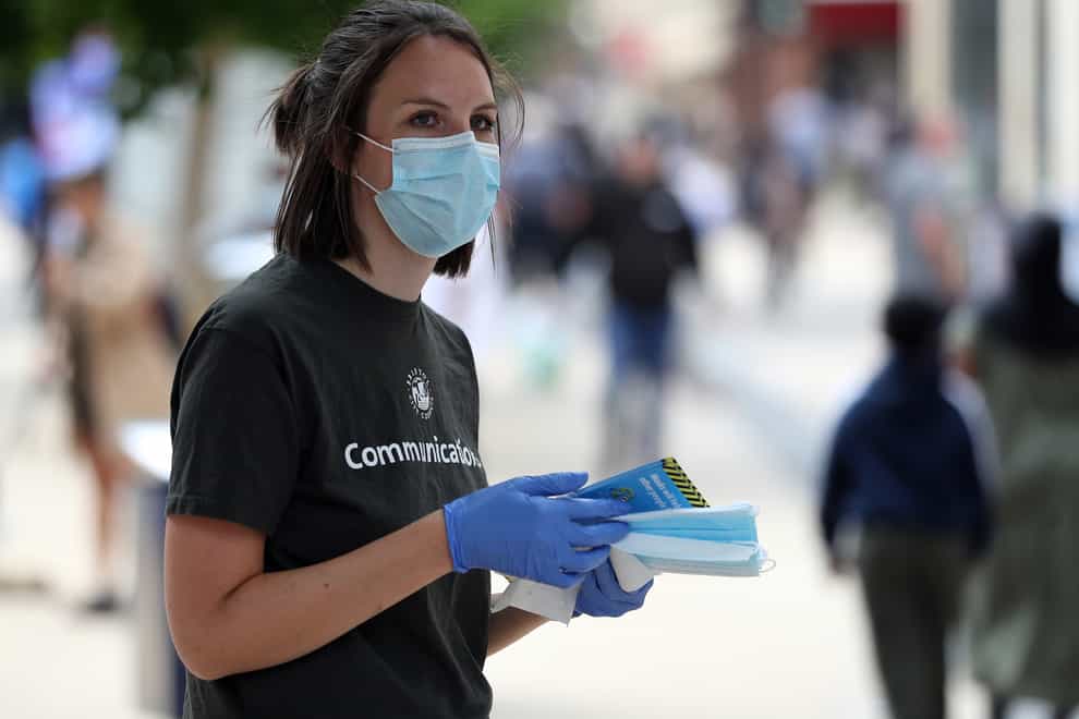 Coronavirus face coverings handed out