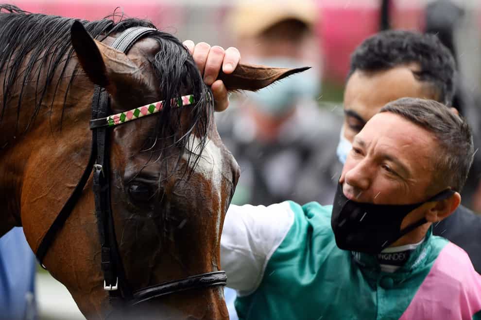 Jockey Frankie Dettori and Enable after their historic victory in the King George VI and Queen Elizabeth QIPCO Stakes at Ascot