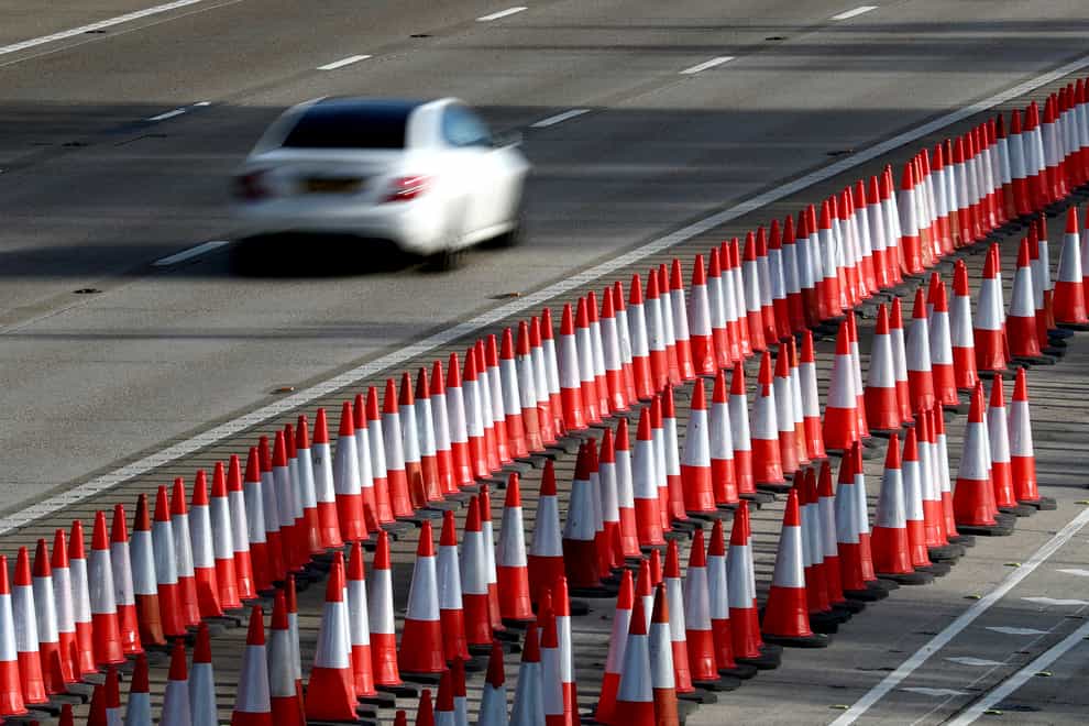 Speed limits past motorway roadworks will be increased to cut journey times and ease drivers' frustrations (Gareth Fuller/PA)