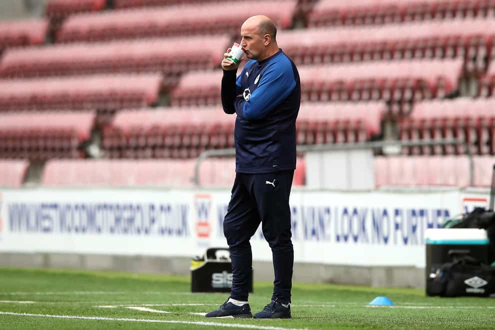 Paul Cook was unable to keep Wigan in the Sky Bet Championship after they were hit with a 12-point deduction