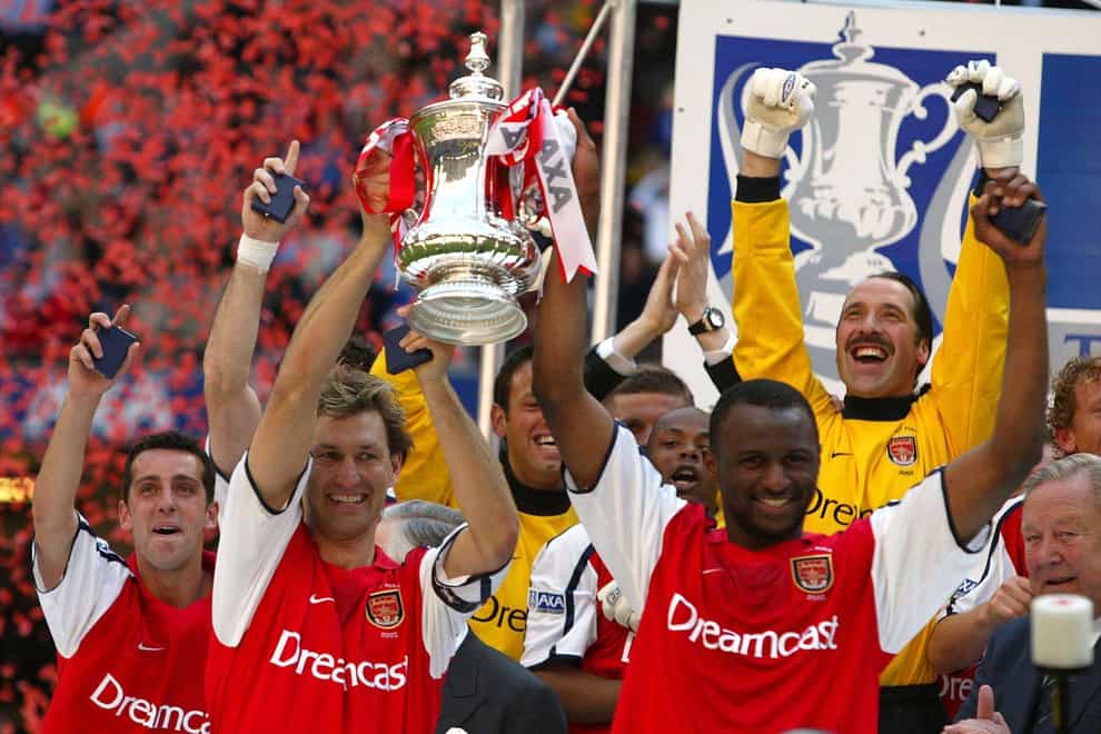 Arsenal captain Tony Adams, left, and Patrick Vieira lifted the FA Cup in Cardiff
