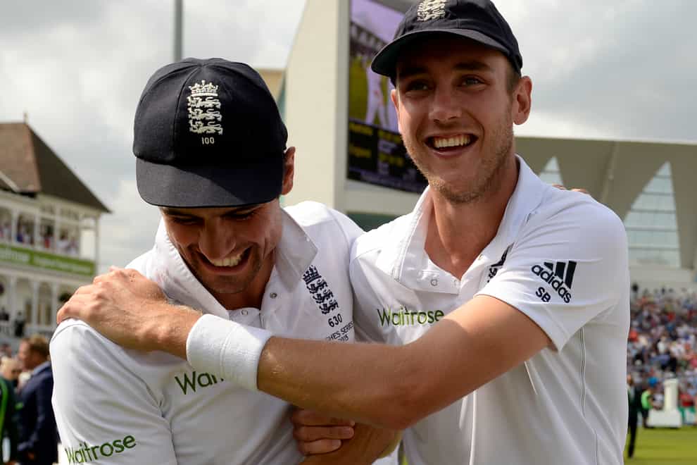 England’s Stuart Broad, right, and Alastair Cook celebrate after winning the Ashes