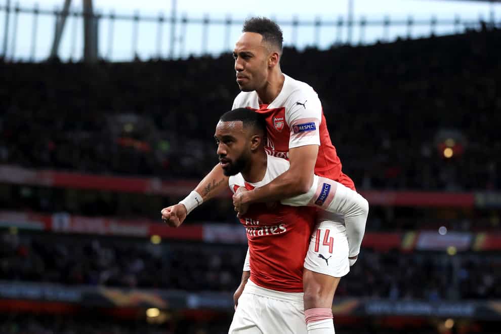 Alexadre Lacazette (bottom) and Pierre-Emerick Aubameyang have forged a fine understanding at Arsenal.