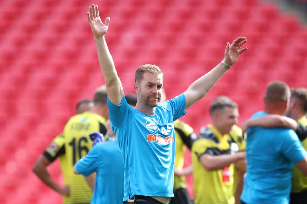 Harrogate Town manager Simon Weaver is celebrating his side's stunning promotion success