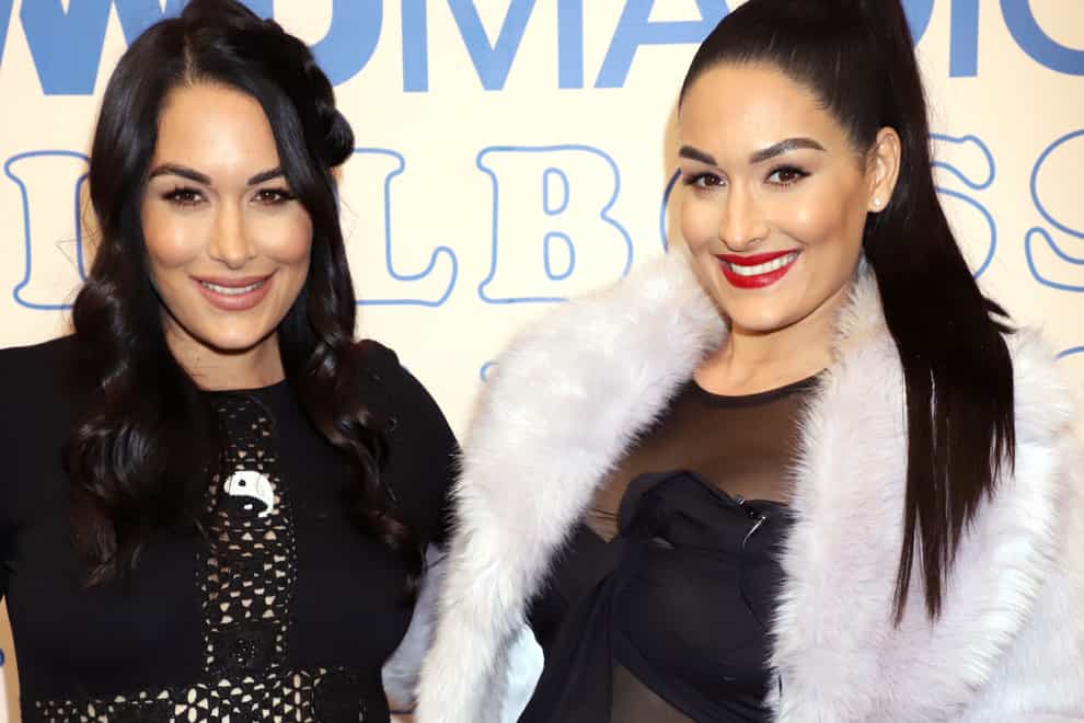 Identical twins Brie and Nikki Bella have given birth just a day apart 